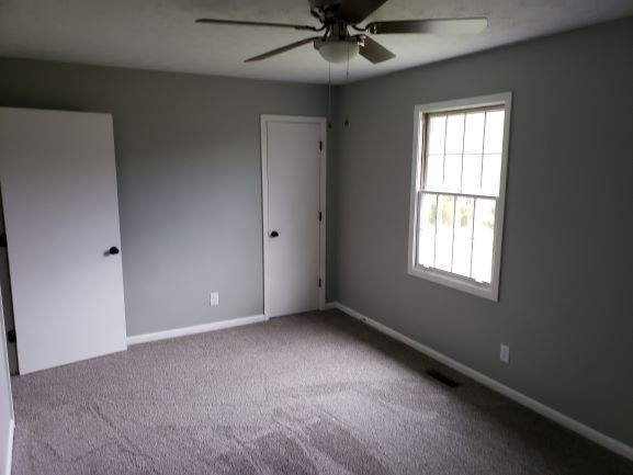 27 Sloan Branch Road Pleasant Shade, TN 37145 - Photo 22 of 35 a view of an empty room with a window