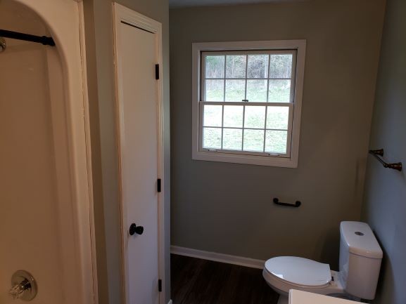 27 Sloan Branch Road Pleasant Shade, TN 37145 - Photo 29 of 35 a white toilet sitting next to a bathroom