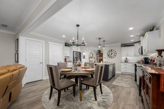 a view of a dining room with furniture
