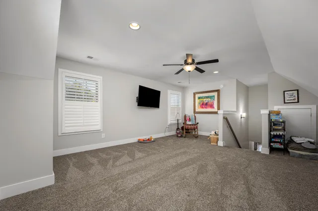 a view of a livingroom with a flat screen tv