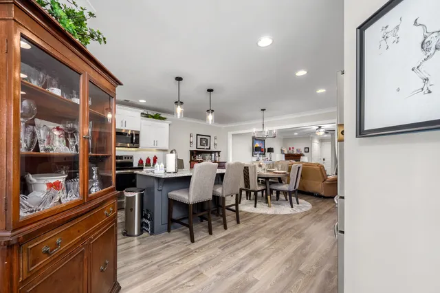 a group of people sitting in a living room