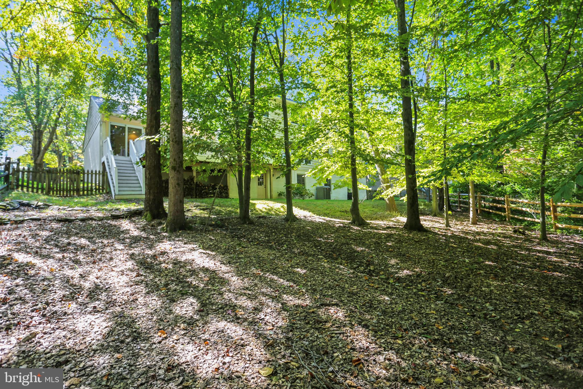 9225 Cranford Drive Potomac, MD 20854 - Photo 21 of 49 View of fenced backyard from the deck