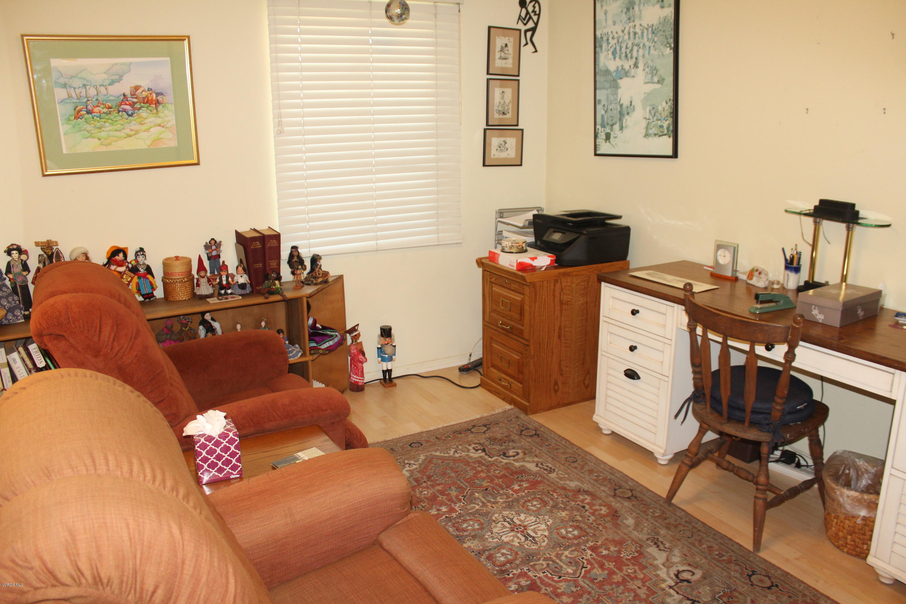 1219 West Roderick Avenue Oxnard, CA 93030 - Photo 9 of 15 a bedroom with furniture and a window