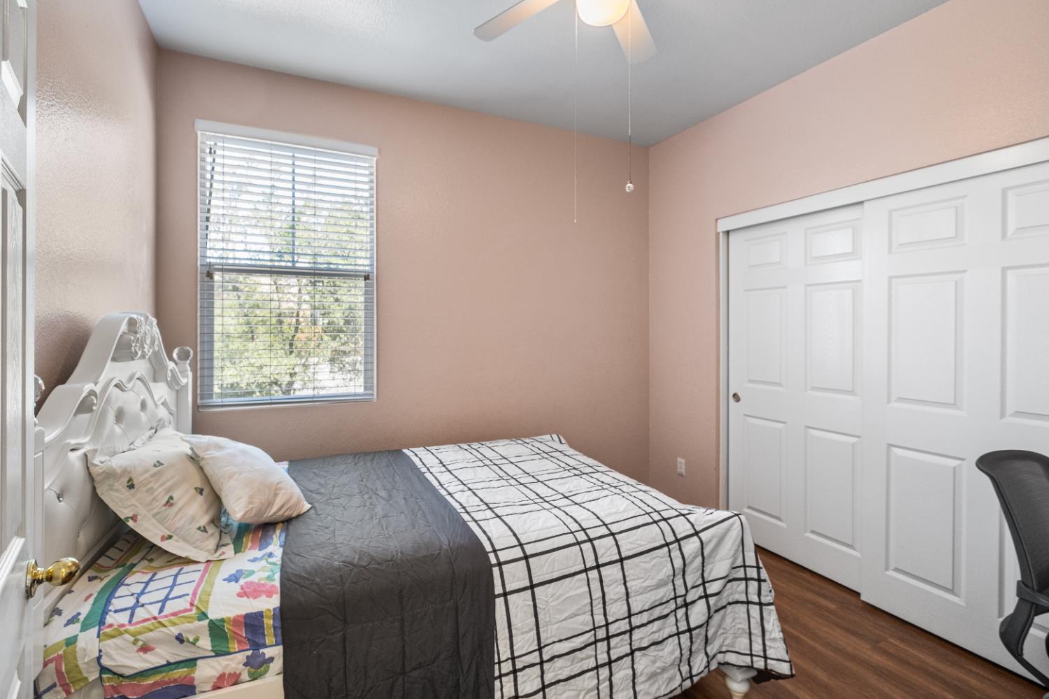 692 Humbert Street Folsom, CA 95630 - Photo 13 of 28 a bedroom with a bed and a window