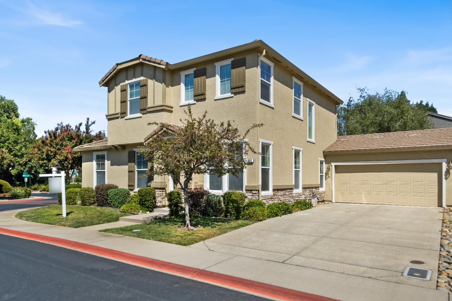 692 Humbert Street Folsom, CA 95630 - Photo 2 of 28 a front view of a house with a yard