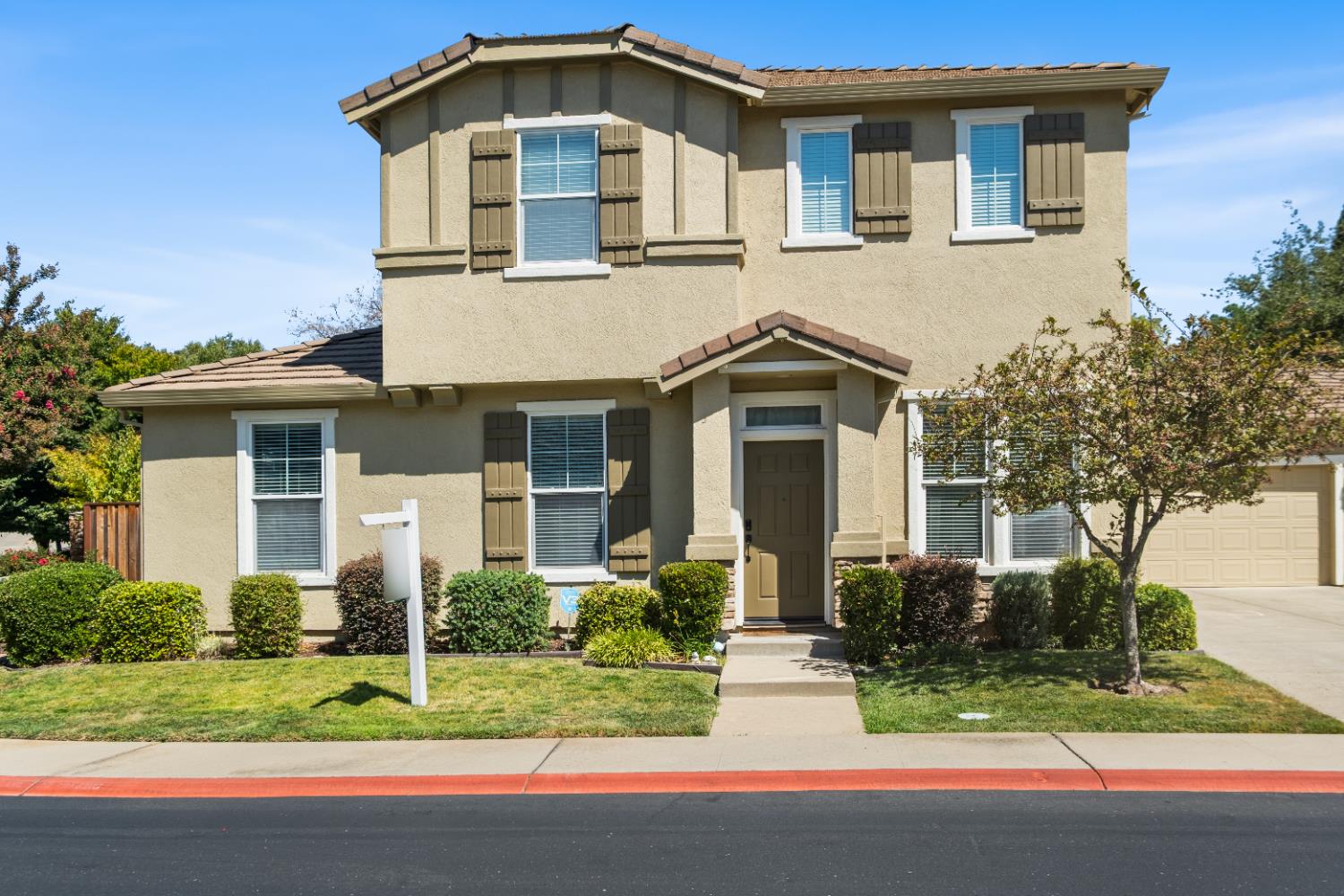 692 Humbert Street Folsom, CA 95630 - Photo 3 of 28 a front view of a house with a yard