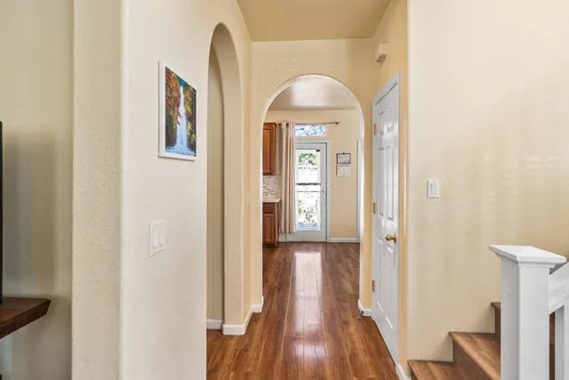 a view of a livingroom from a hallway