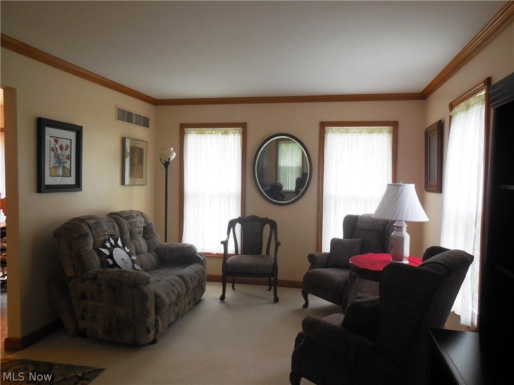 104 Hurd Road Aurora, OH 44202 - Photo 3 of 30 Formal living room, this is just 1/2 of the room, it's a large room and if you wanted a big family room this would work for that.