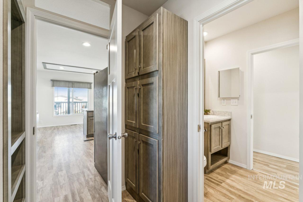 2750 Alden Road, Unit 2 Fruitland, ID 83619 - Photo 17 of 24 Corridor with light wood-style floors and recessed lighting