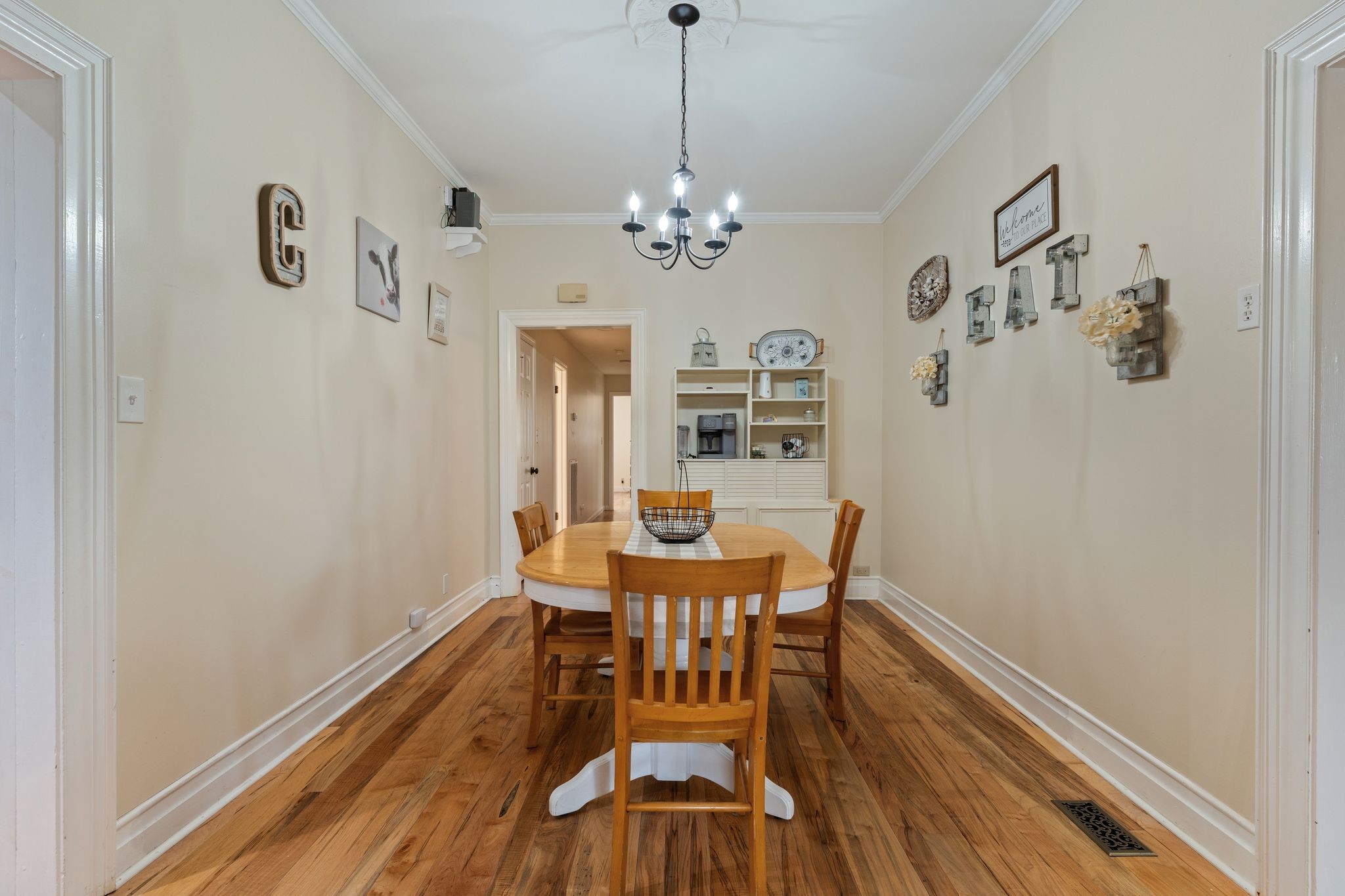 5867 Borthick Road Springfield, TN 37172 - Photo 12 of 43 a view of a dining room with furniture and wooden floor