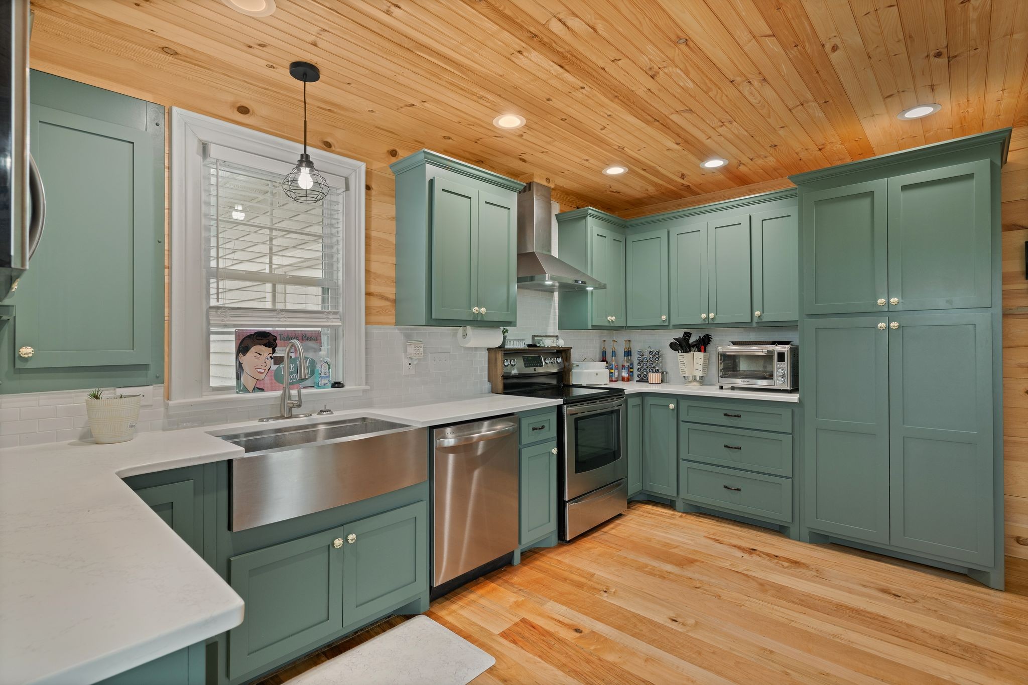 5867 Borthick Road Springfield, TN 37172 - Photo 15 of 43 a kitchen with a sink cabinets and stainless steel appliances