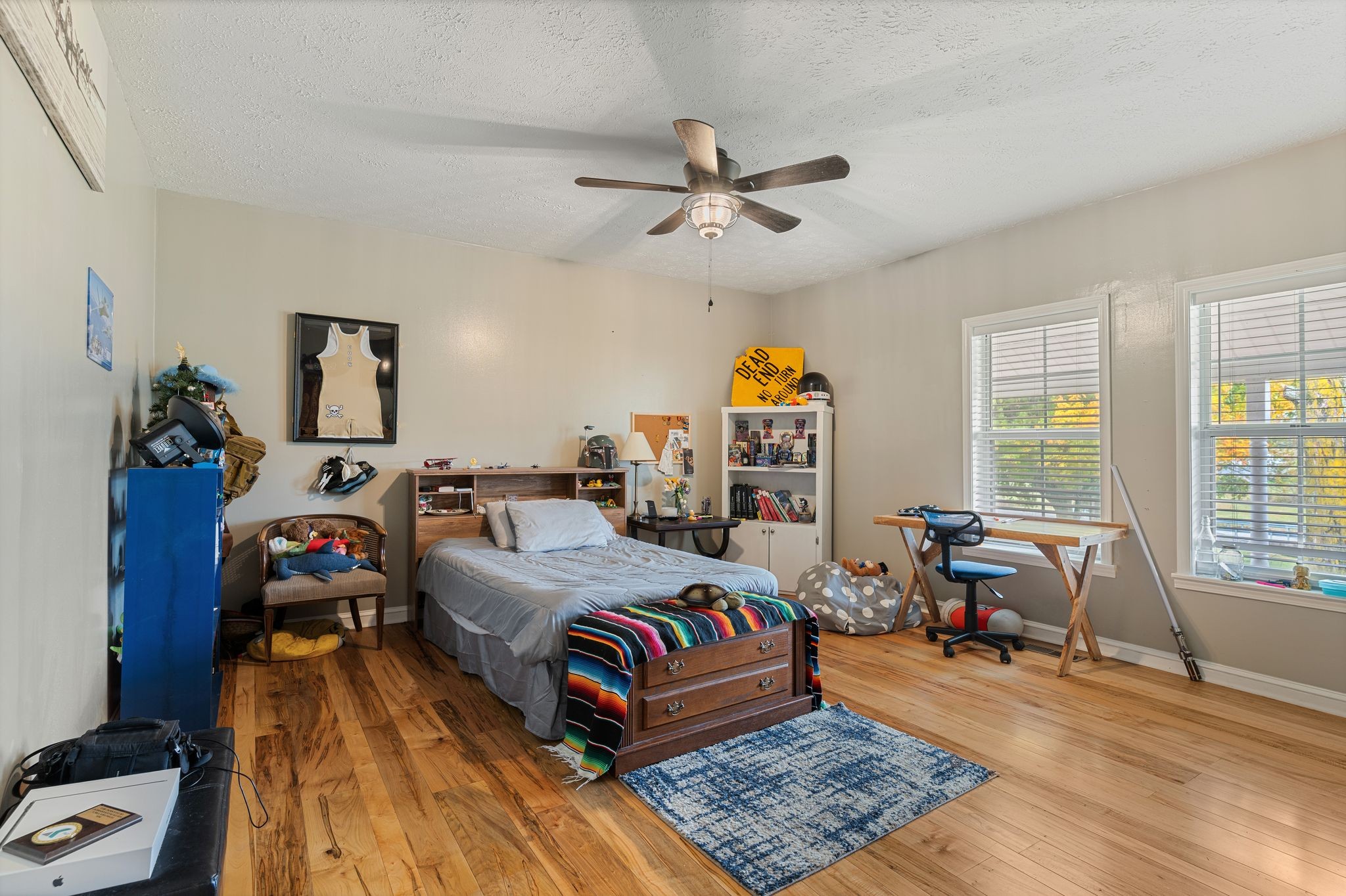 5867 Borthick Road Springfield, TN 37172 - Photo 22 of 43 a bedroom with a bed and wooden floor