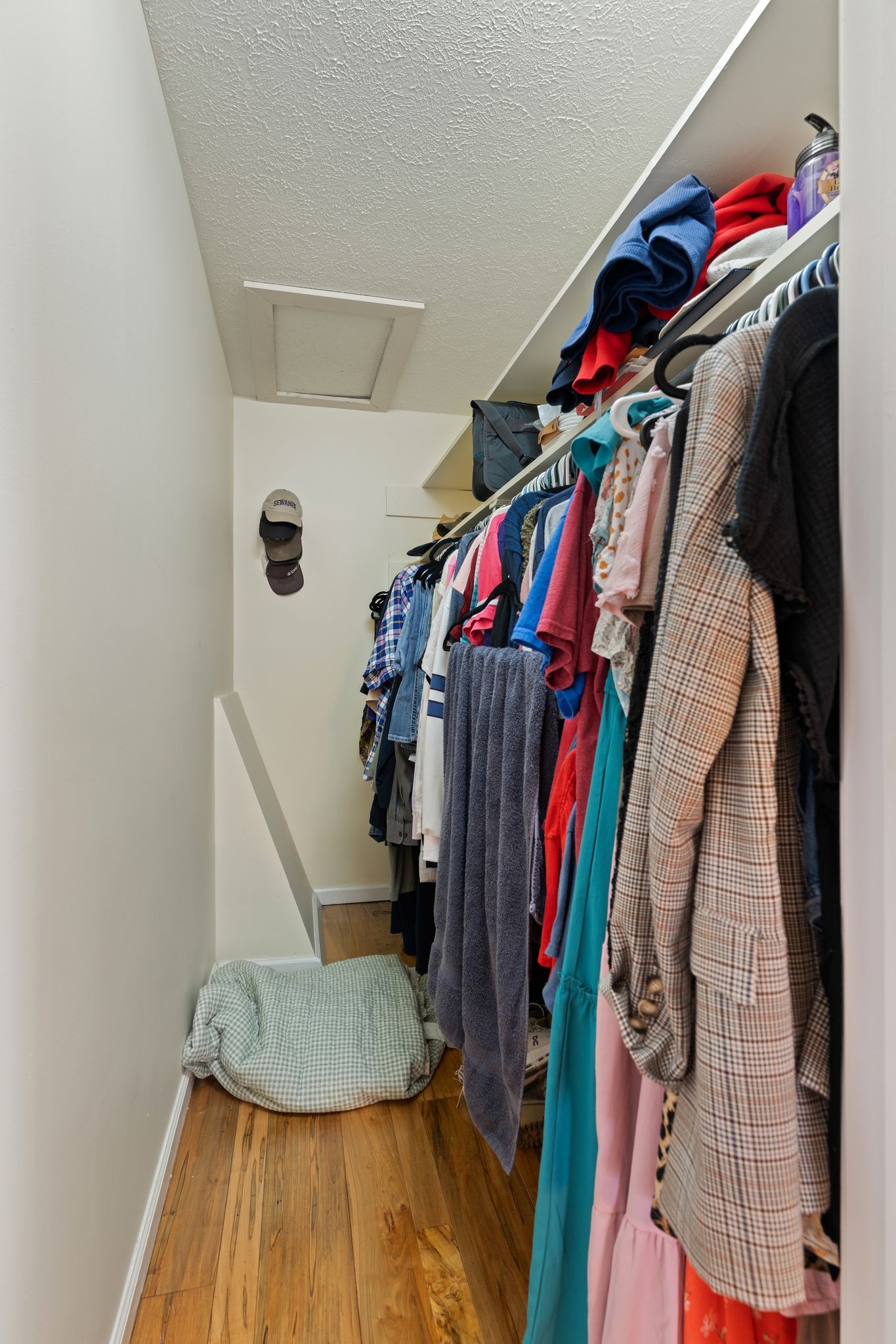 5867 Borthick Road Springfield, TN 37172 - Photo 26 of 43 a view of walk in closet with clothes and shoes