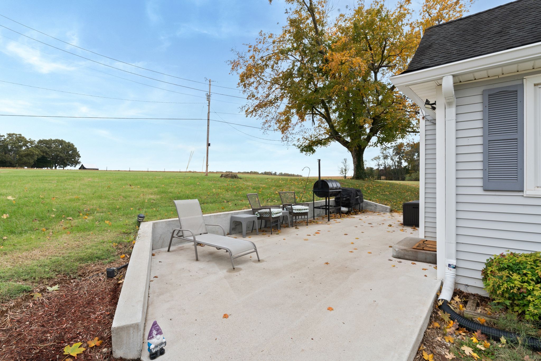 5867 Borthick Road Springfield, TN 37172 - Photo 29 of 43 a view of a backyard with plants and a patio