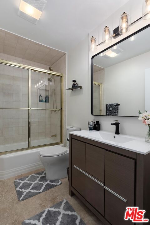 4221 Vanetta Drive Studio City, CA 91604 - Photo 28 of 41 a bathroom with a sink a toilet and shower