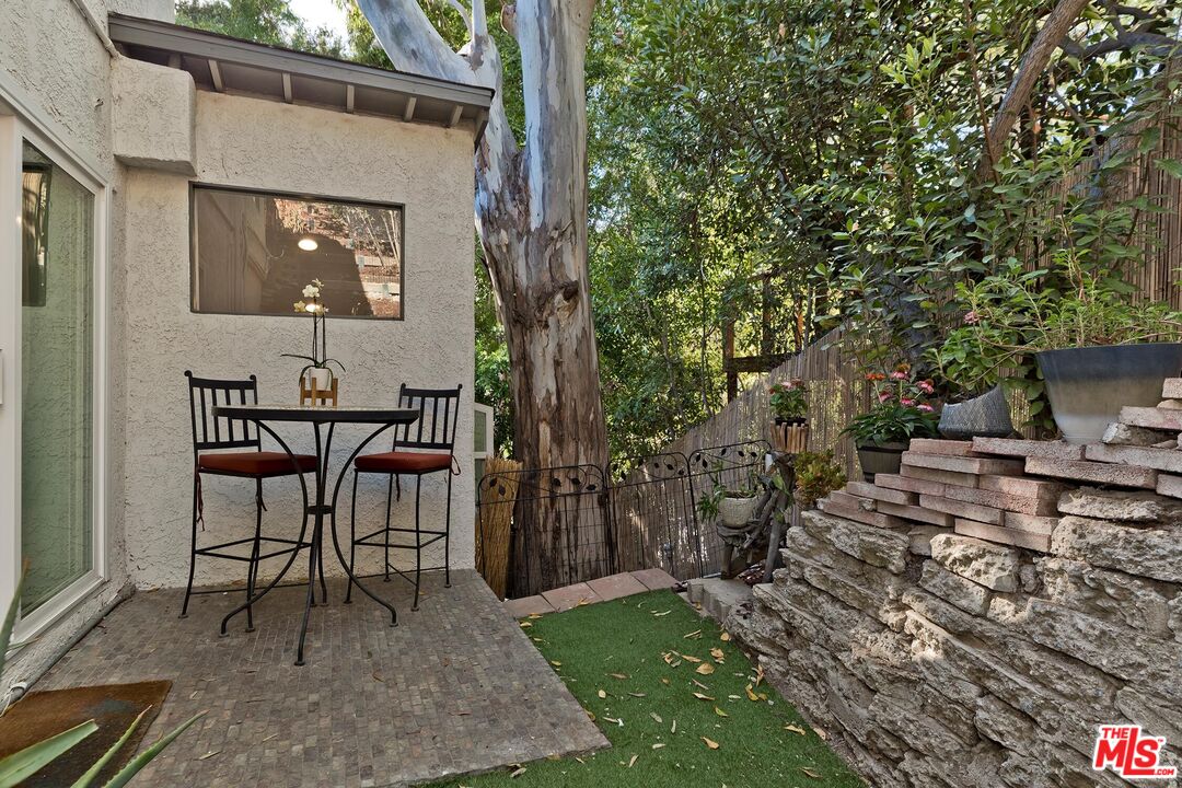 4221 Vanetta Drive Studio City, CA 91604 - Photo 29 of 41 a view of a dinning tables and chairs in the patio