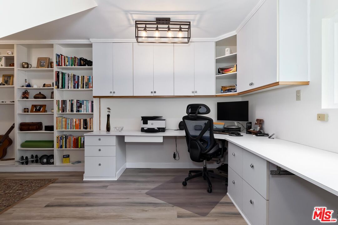 4221 Vanetta Drive Studio City, CA 91604 - Photo 31 of 41 a view of a workspace with furniture and wooden floor