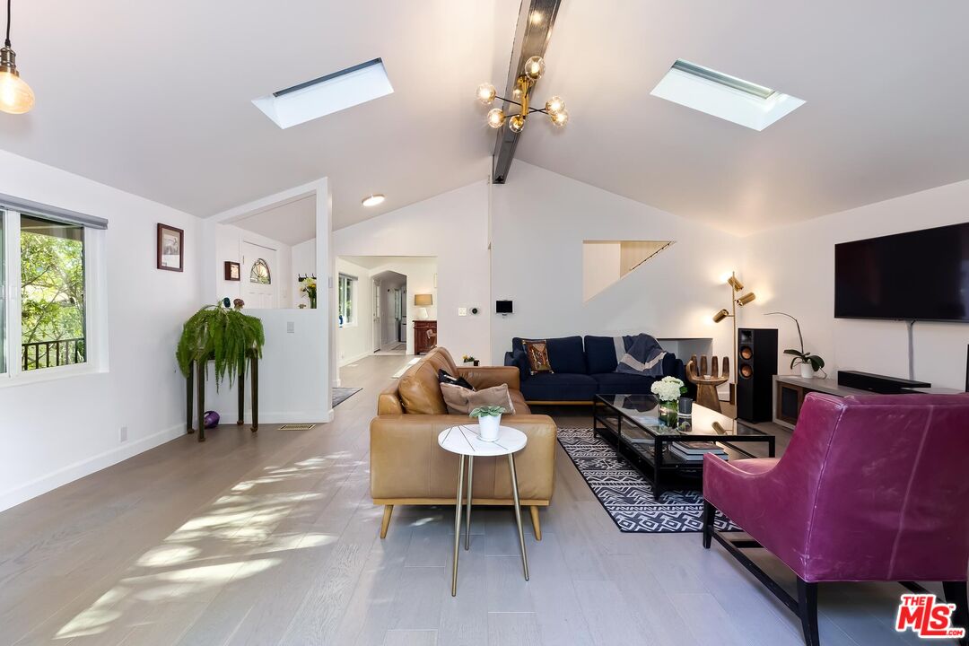 4221 Vanetta Drive Studio City, CA 91604 - Photo 6 of 41 a living room with furniture and a flat screen tv