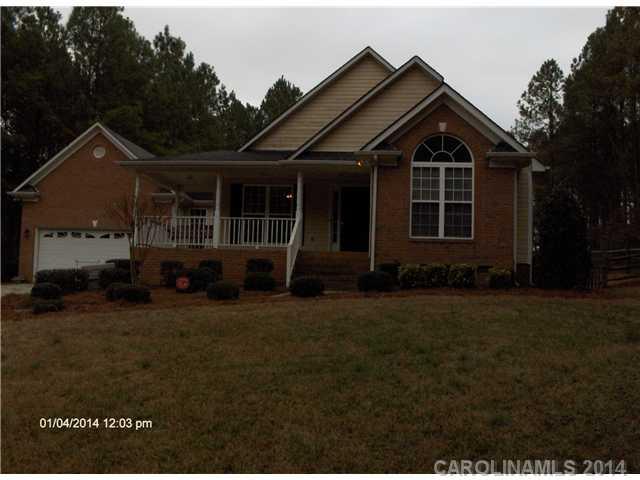1607 Stack Road Monroe, NC 28112 - Photo 1 of 8 a front view of a house with a yard