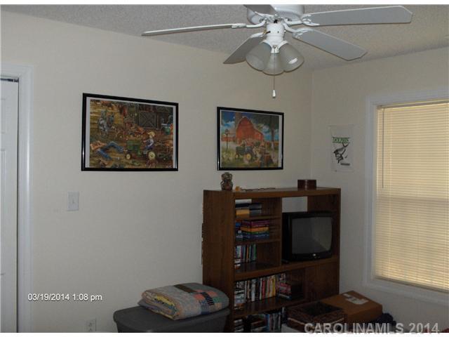 1607 Stack Road Monroe, NC 28112 - Photo 5 of 8 a living room with furniture and a window