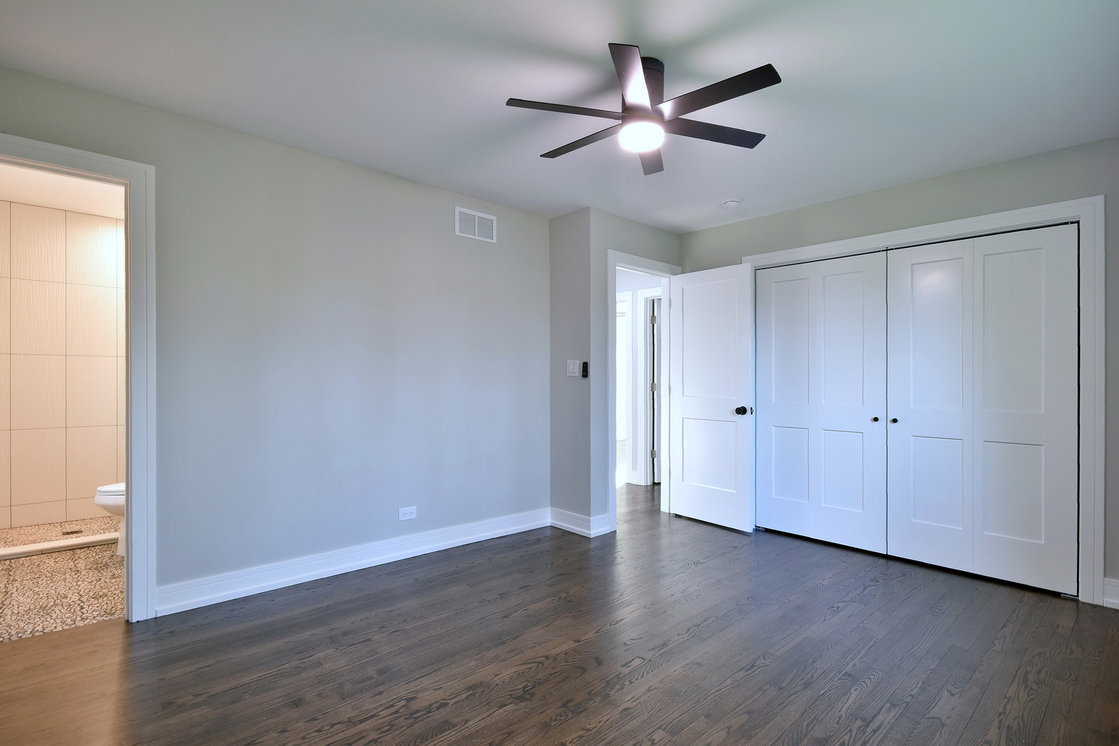 7609 Baker Court Darien, IL 60561 - Photo 28 of 39 a view of an empty room with wooden floor