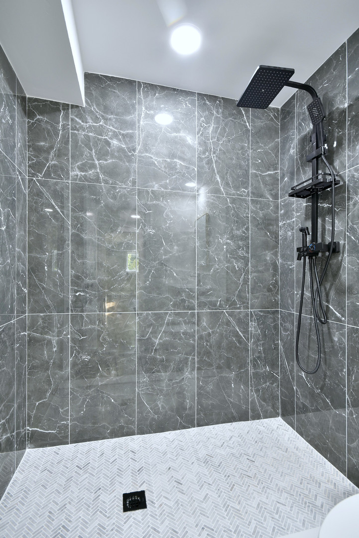 7609 Baker Court Darien, IL 60561 - Photo 31 of 39 a bathroom with a shower