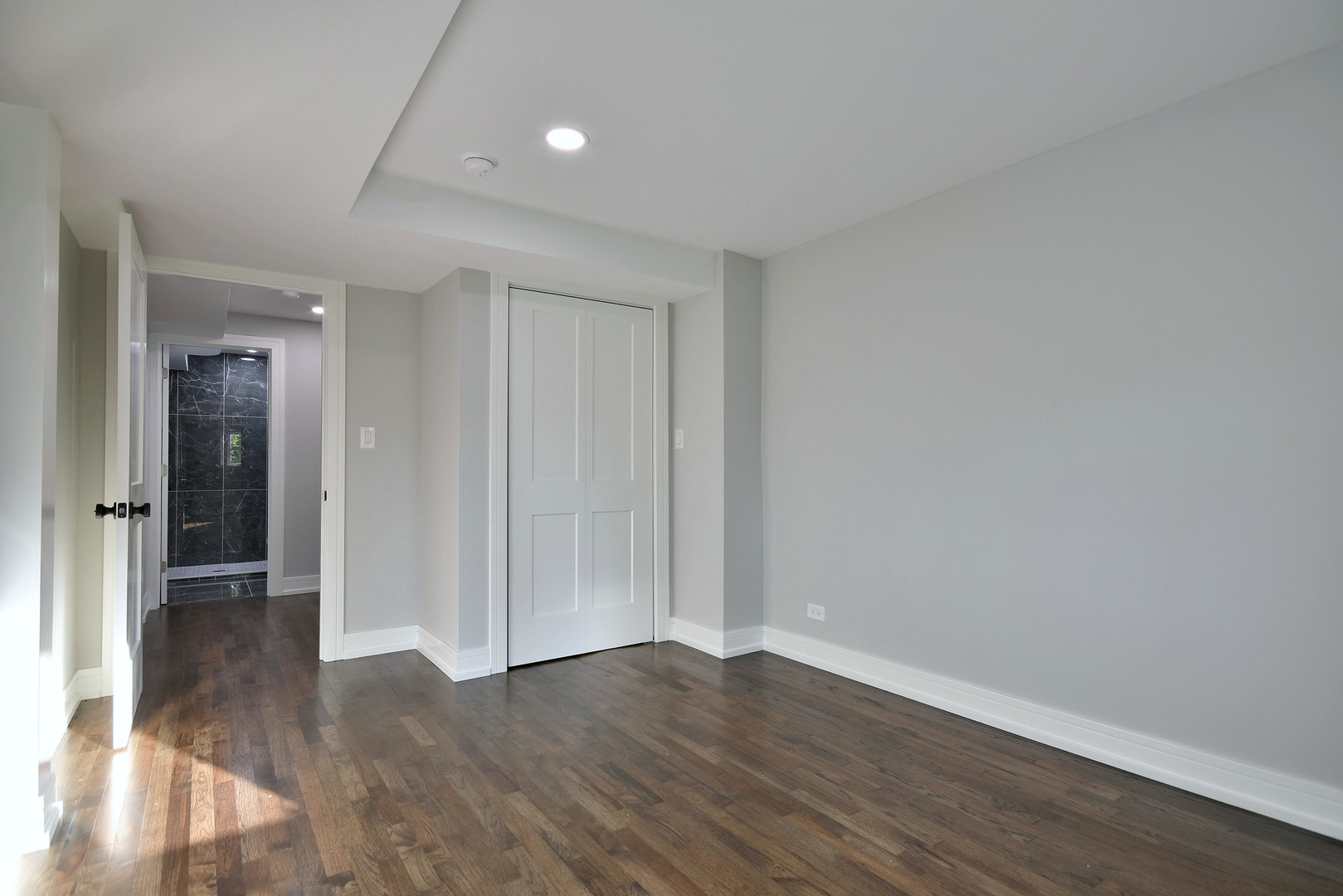 7609 Baker Court Darien, IL 60561 - Photo 33 of 39 wooden floor in an empty room