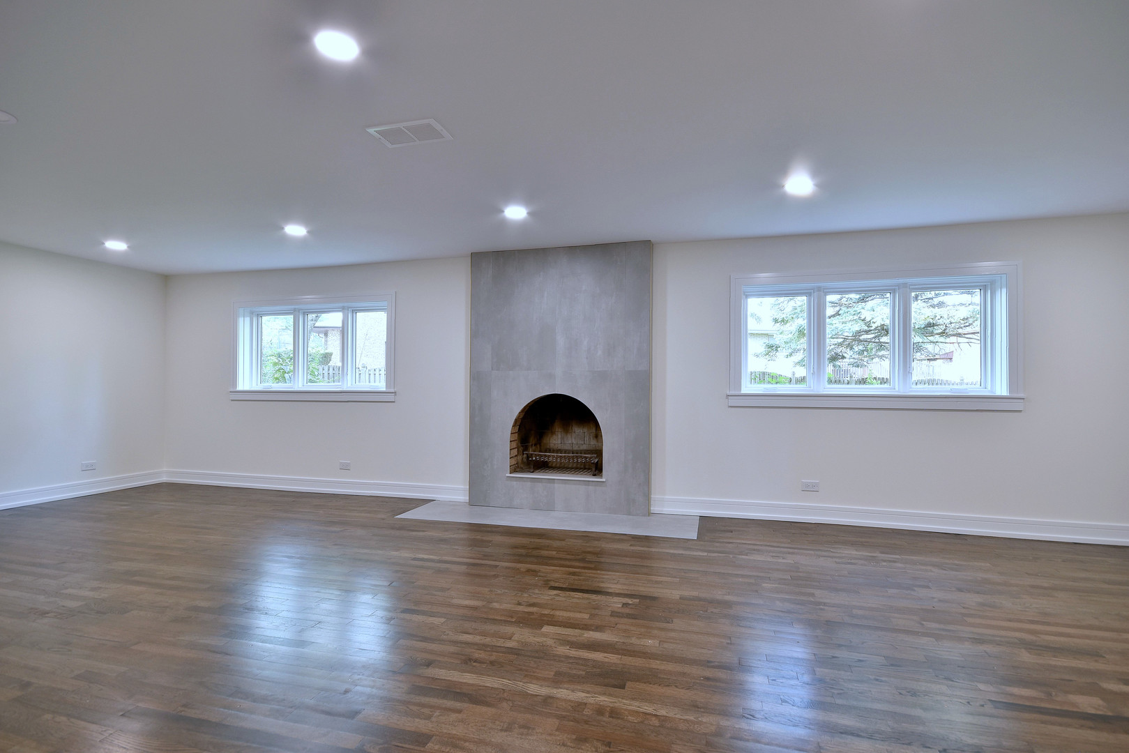 7609 Baker Court Darien, IL 60561 - Photo 34 of 39 an empty room with wooden floor and windows