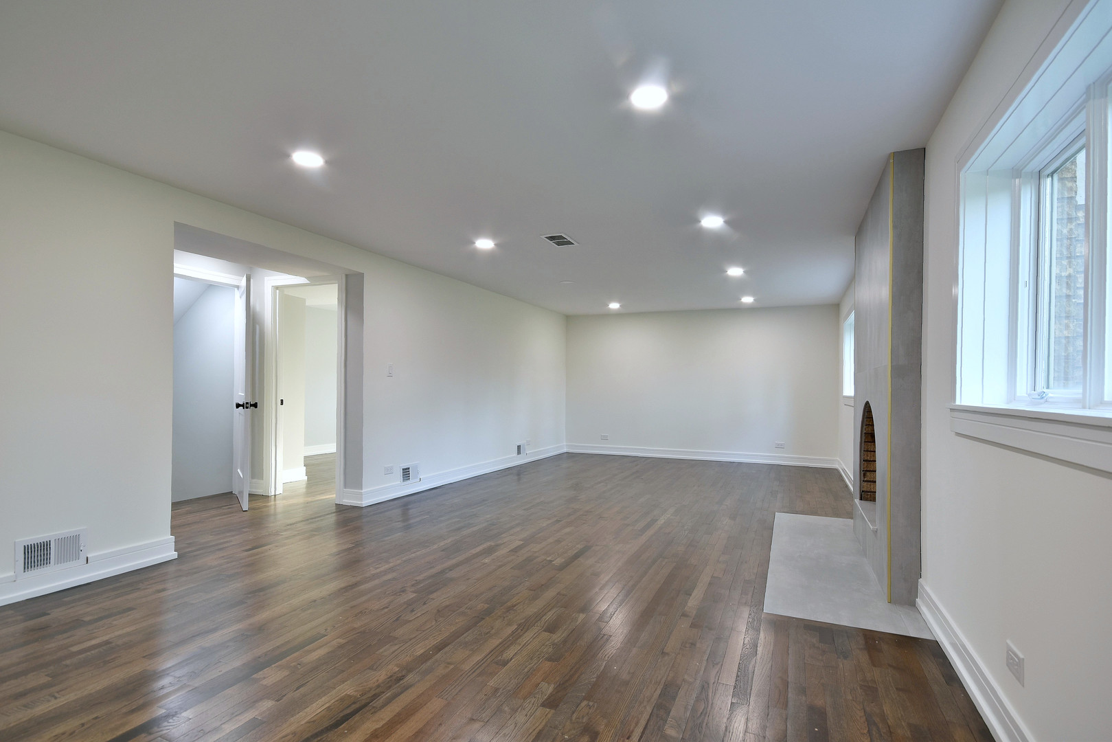 7609 Baker Court Darien, IL 60561 - Photo 36 of 39 an empty room with wooden floor and windows