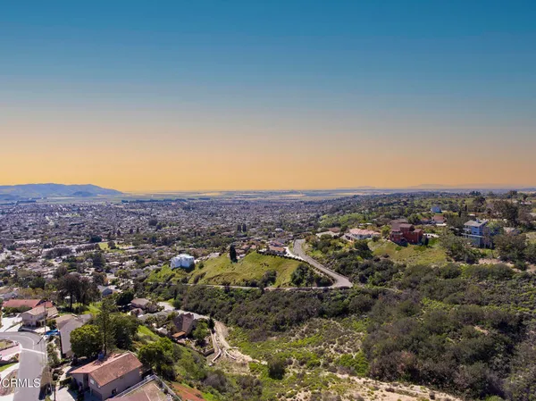 an aerial view of residential house and outdoor space