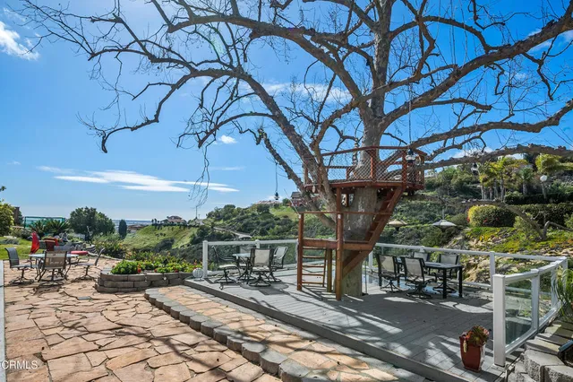 a view of a chairs and tables in the patio