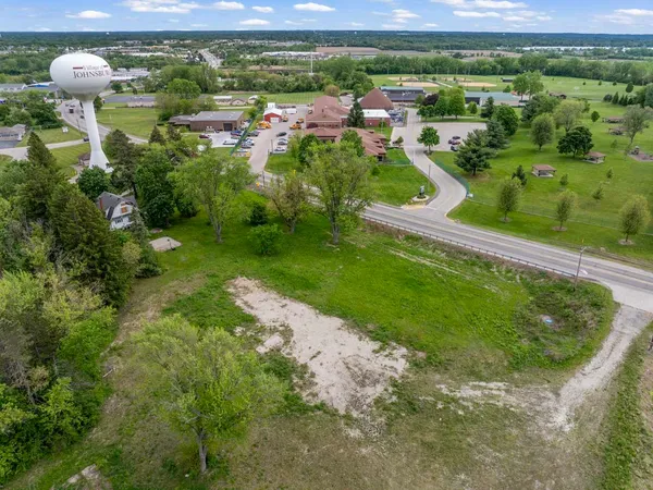 a view of a garden with a lake view