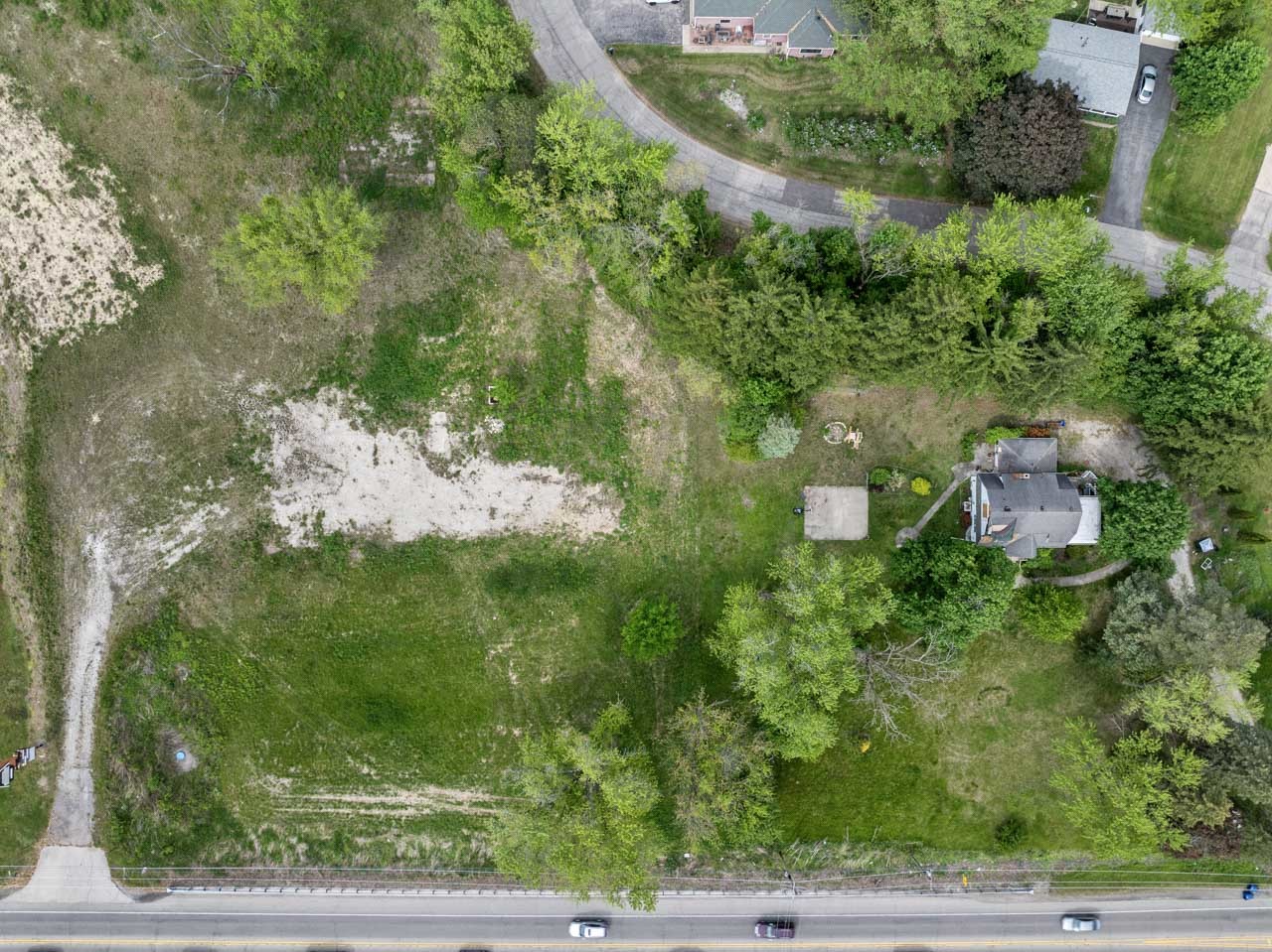 3702 North Richmond Road Johnsburg, IL 60051 - Photo 4 of 6 a view of a lake with a house