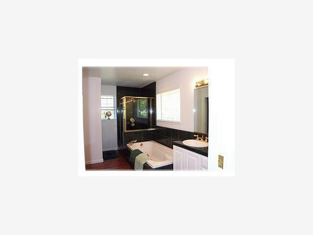 1639 Hall Ranch Road Santa Cruz, CA 95065 - Photo 8 of 9 a hallway with a large window and mirror