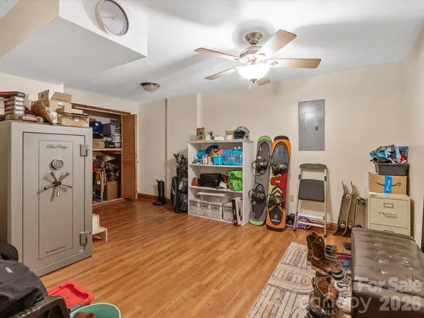 a room with furniture and a flat screen tv