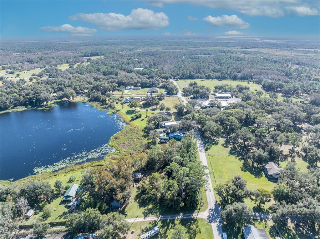 4th Street Osteen, FL 32764 - Photo 15 of 20 an aerial view of residential houses with outdoor space