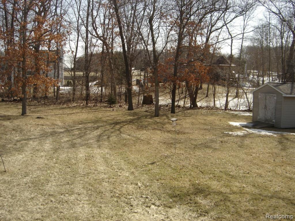 5083 Culver Road Brighton, MI 48114 - Photo 3 of 8 Culver backyard April.jpg