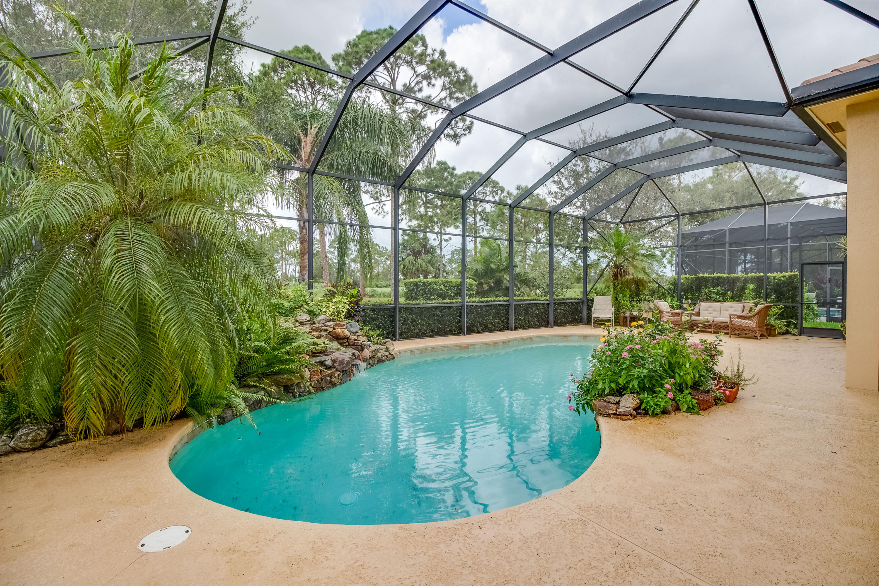 8617 Tompson Point Road Port St. Lucie, FL 34986 - Photo 31 of 38 a view of outdoor space and garden