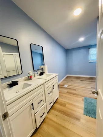 a room with furniture and a flat screen tv