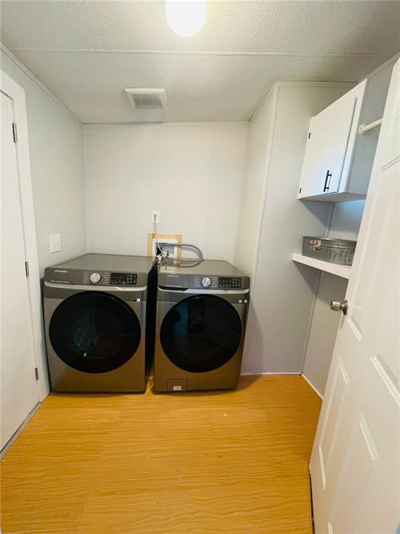 489 Childers Road Colbert, GA 30628 - Photo 17 of 30 a utility room with sink dryer and washer