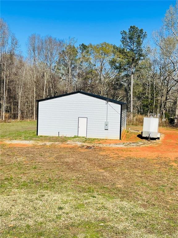 489 Childers Road Colbert, GA 30628 - Photo 24 of 30 a view of a big room with mountain and trees