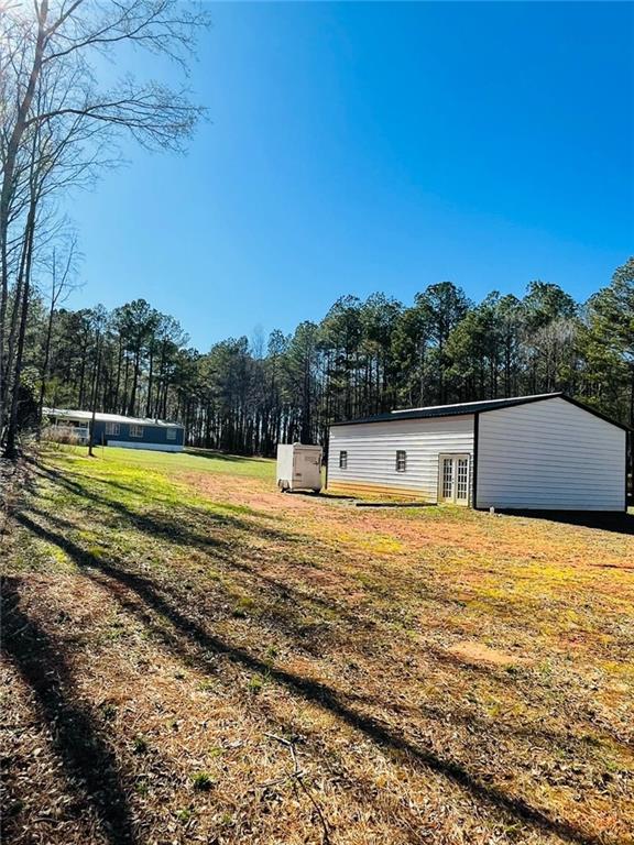 489 Childers Road Colbert, GA 30628 - Photo 25 of 30 a view of swimming pool with an ocean view
