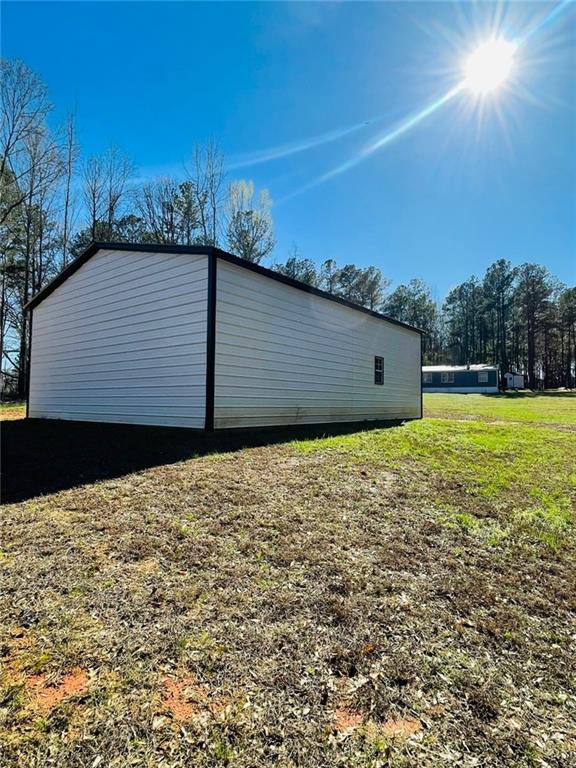 489 Childers Road Colbert, GA 30628 - Photo 27 of 30 a view of a backyard