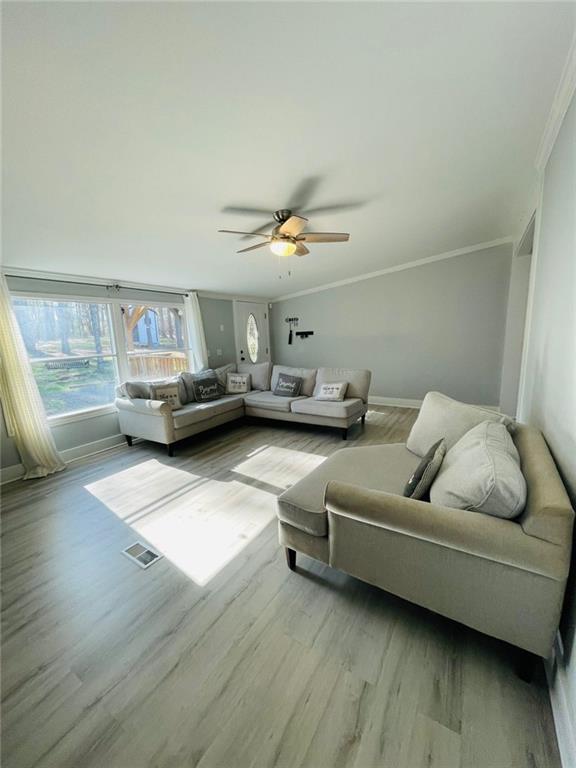 489 Childers Road Colbert, GA 30628 - Photo 4 of 30 a living room with furniture and a large window