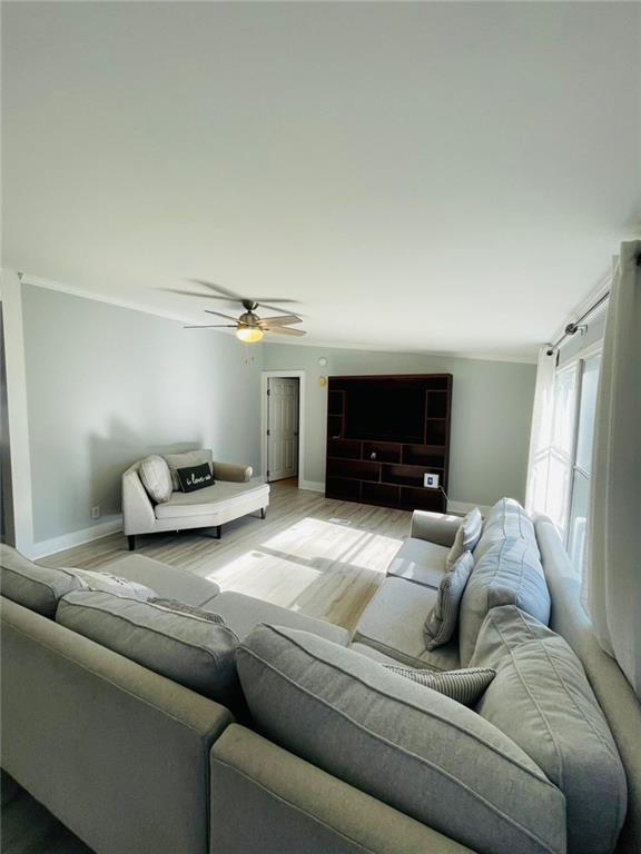 489 Childers Road Colbert, GA 30628 - Photo 5 of 30 a living room with furniture and a flat screen tv