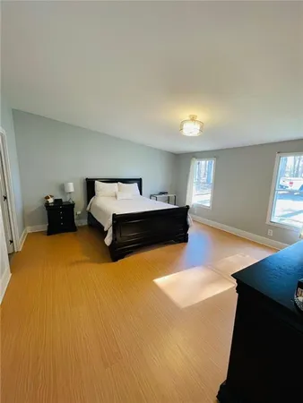 a living room with furniture a bed and a couch