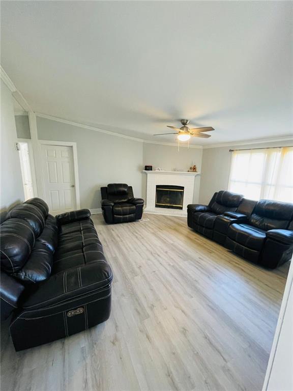 489 Childers Road Colbert, GA 30628 - Photo 10 of 30 a living room with furniture a bed and a couch