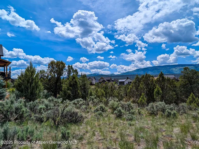 a view of a houses with a yard