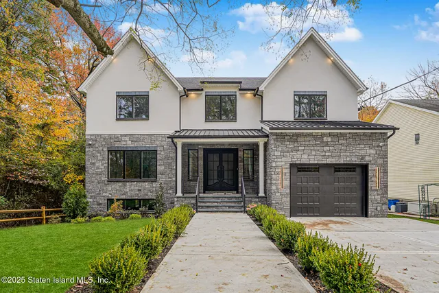 a kitchen with a sink cabinets and window