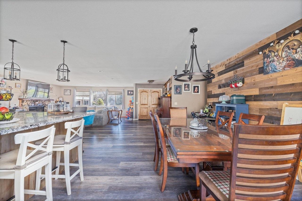 36820 Mudge Ranch Road Coarsegold, CA 93614 - Photo 16 of 75 a dining room with furniture window and wooden floor